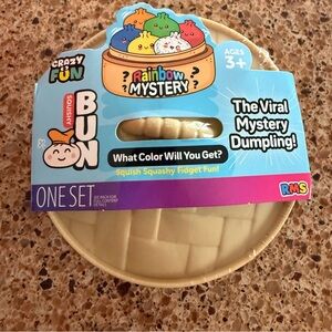 NWT Rainbow mystery Squishy bun dumpling sensory toy